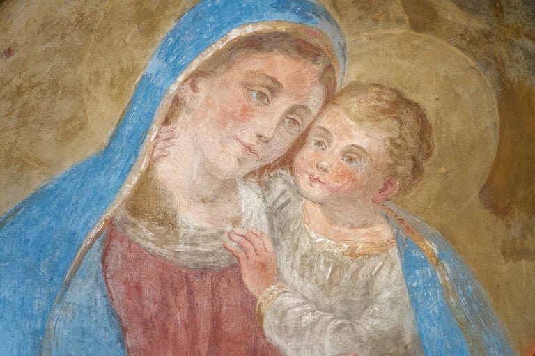 Blessed Virgin Mary holding baby Jesus Christ in church fresco